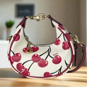 Coach Jonie Bag Cherry Print Mini Crossbody Wristlet Glovetanned Leather CR508